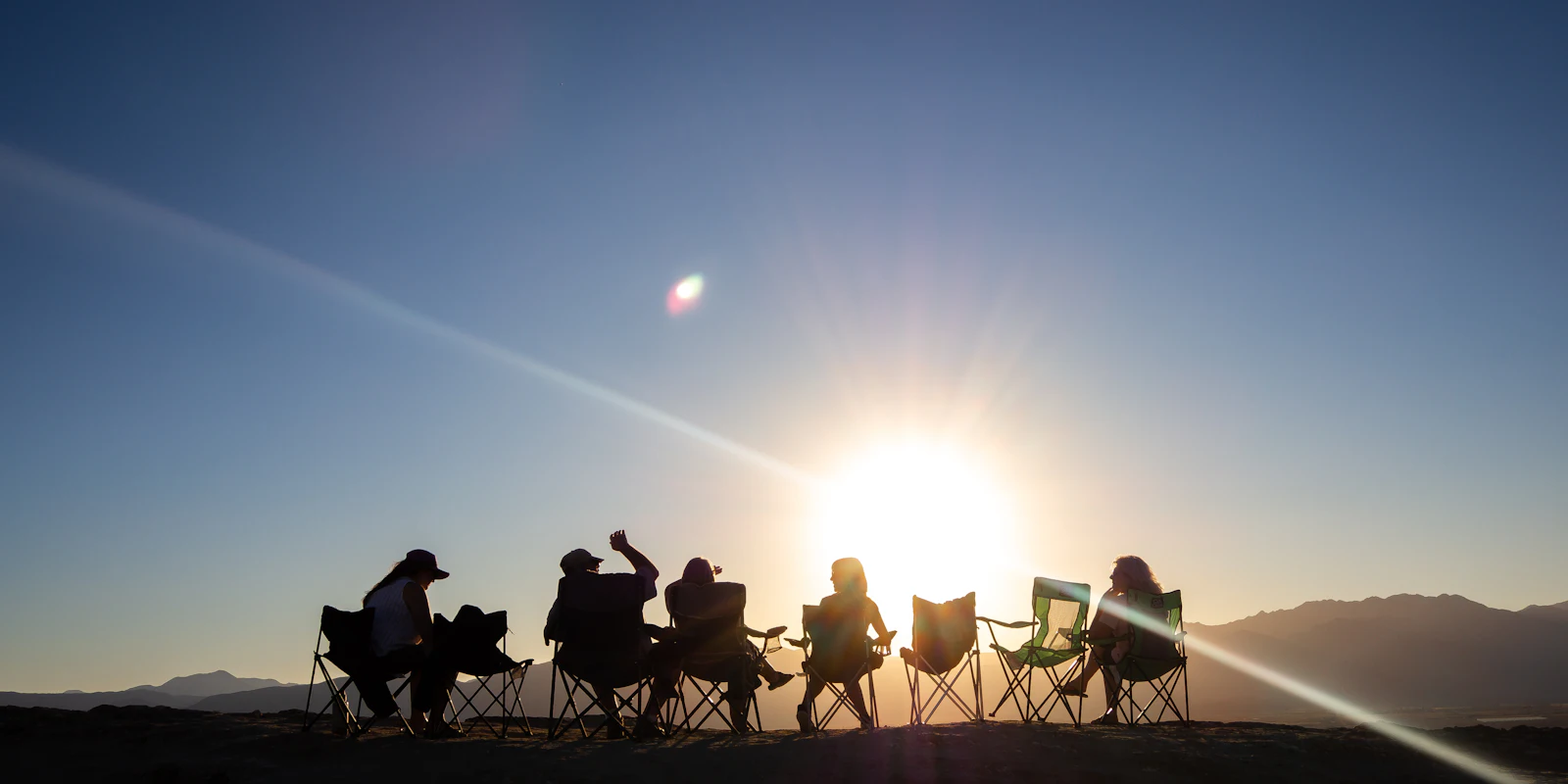 Friends watching the sunset together